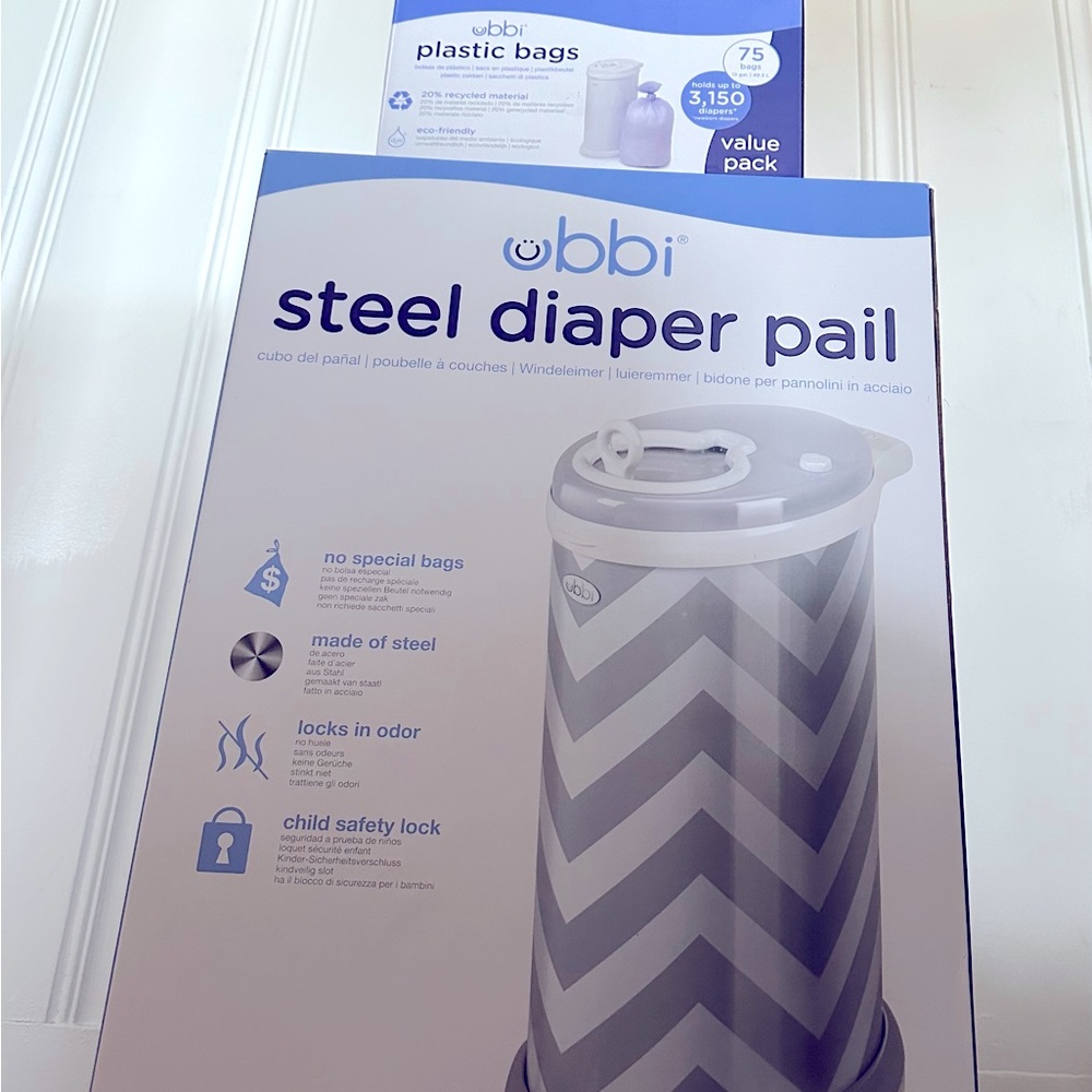 Brand New In Box - Ubbi Steel Odor Locking Diaper Pail. 75 bag inserts included